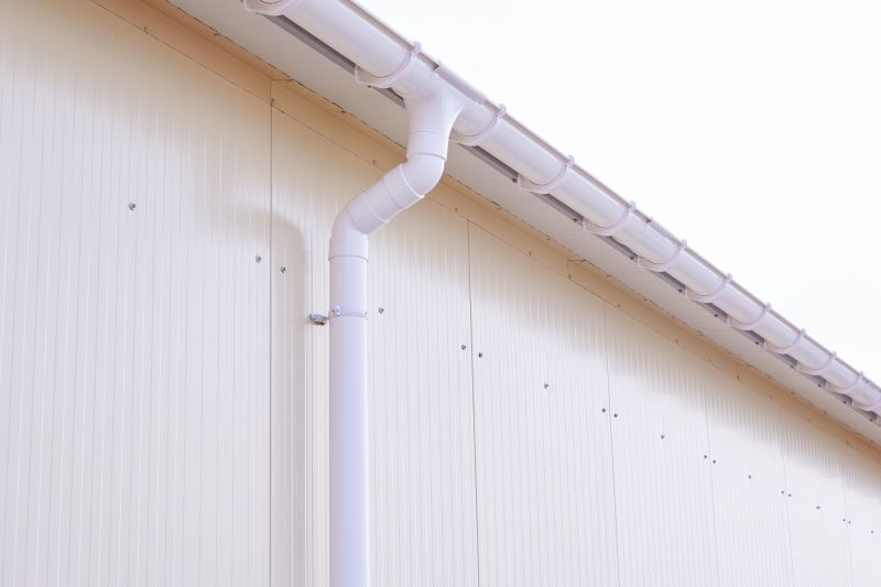 Plastic Downspout Installation in Boulder, CO